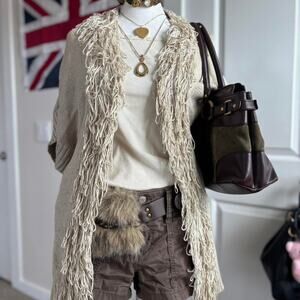 Cream short sleeve frillyfringe cardigan